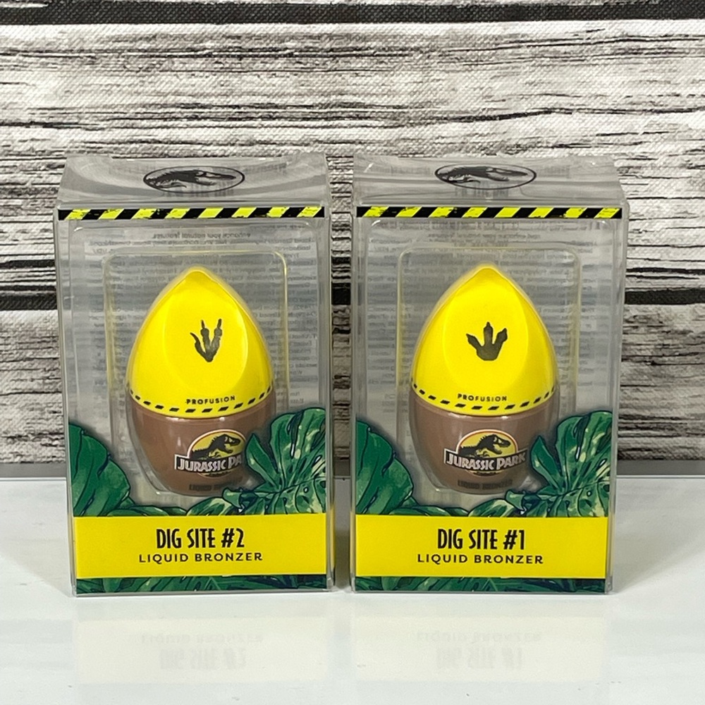 Jurassic Park Profusion Dig Site 1 & 2 Liquid Bronzer - 1 & 2 - New